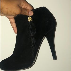 Guess high heals w/ gold buckles